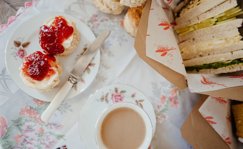 Scone with cream and jam and sandwiches from Heartfelt Vintage
